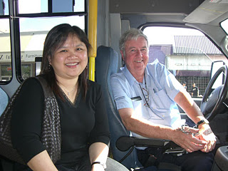 bus driver and woman passenger bus driver and woman passenger